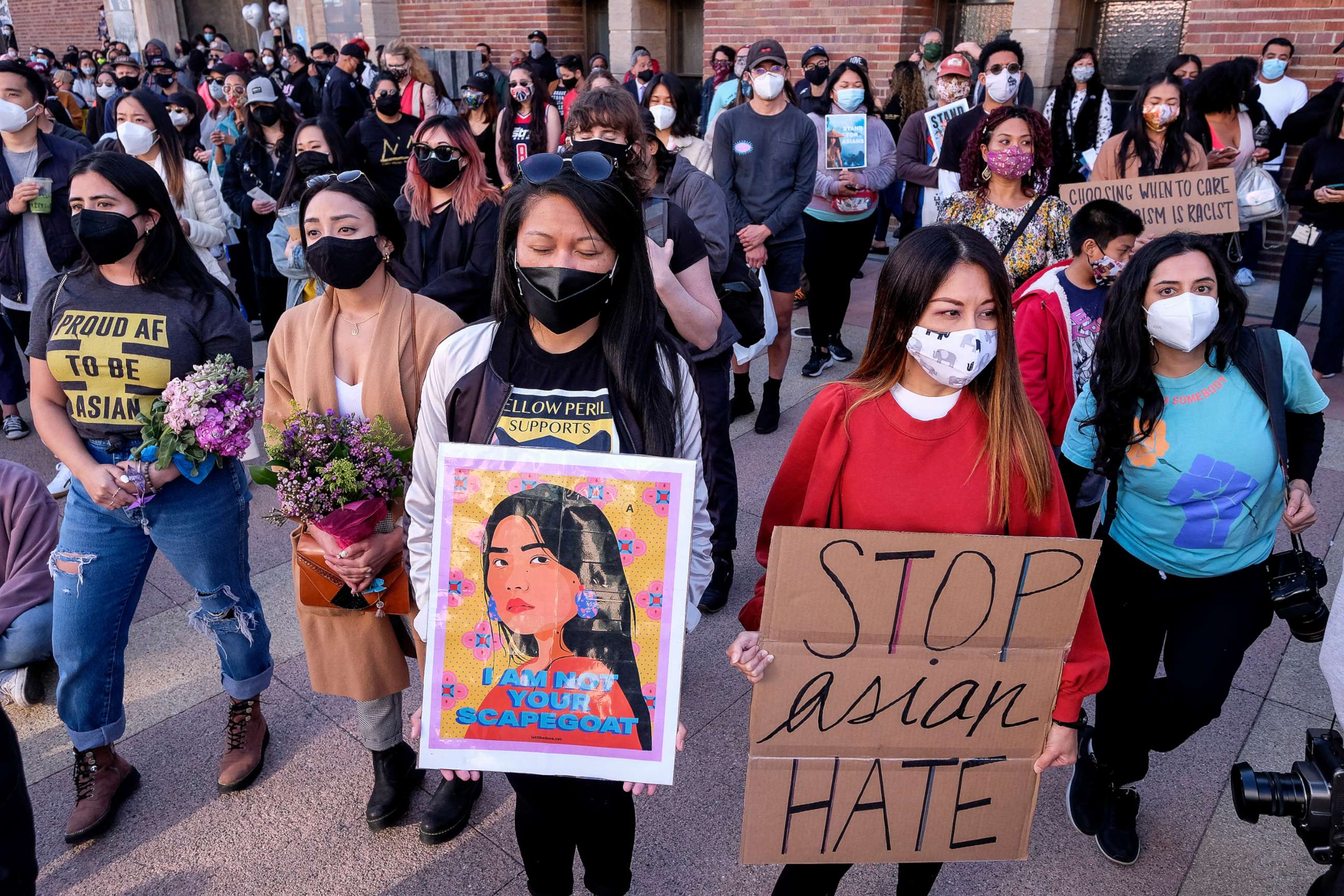 PHOTO: Demonstrators take part in a rally "Love Our Communities: Build Collective Power" to raise awareness of anti-Asian violence, at the Japanese American National Museum in Little Tokyo in Los Angeles, Calif, March 13, 2021.