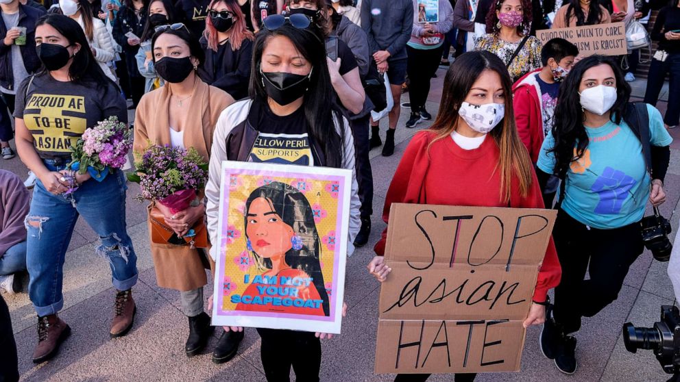 PHOTO: Demonstrators take part in a rally "Love Our Communities: Build Collective Power" to raise awareness of anti-Asian violence, at the Japanese American National Museum in Little Tokyo in Los Angeles, Calif, March 13, 2021.