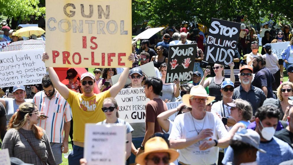 PHOTO: Gun rights activists and supporters protest outside the National Rifle Association Annual Meeting at the George R. Brown Convention Center, on May 27, 2022, in Houston.