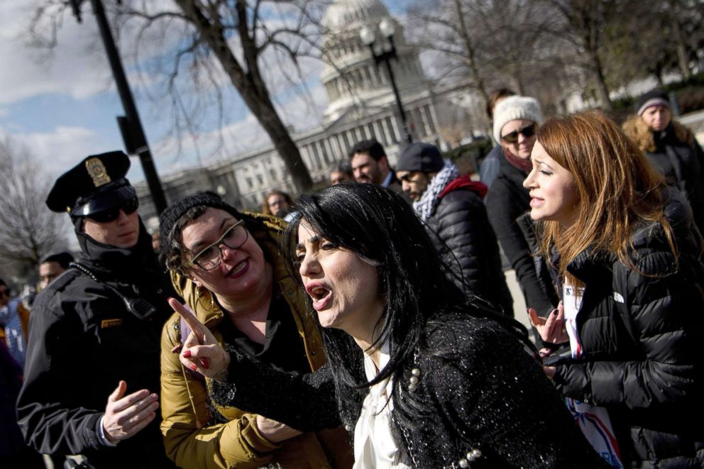 PHOTO: Jewish Voice for Peace Deputy Director Rabbi Alissa Wise, second from left, talks to Rabia Kazan, of the Middle Eastern Womans Collision, as she calls for the resignation of Rep. Ilhan Omar, outside the U.S. Supreme Court, March 6, 2019.