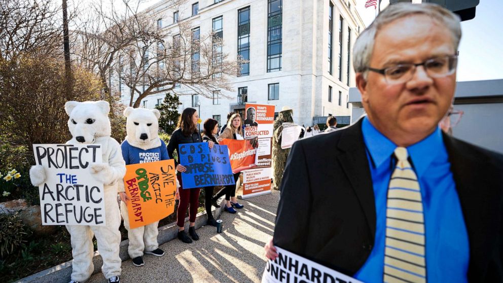 PHOTO: Activists with the consumer rights advocacy group 'Public Citizen' protest the nomination of David Bernhardt to head the Department of the Interior, outside the Dirksen Senate Office Building in Washington, D.C., March 28, 2019.