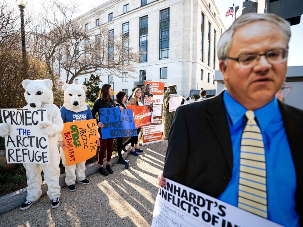 PHOTO: Activists with the consumer rights advocacy group Public Citizen protest the nomination of David Bernhardt to head the Department of the Interior, outside the Dirksen Senate Office Building in Washington, D.C., March 28, 2019.