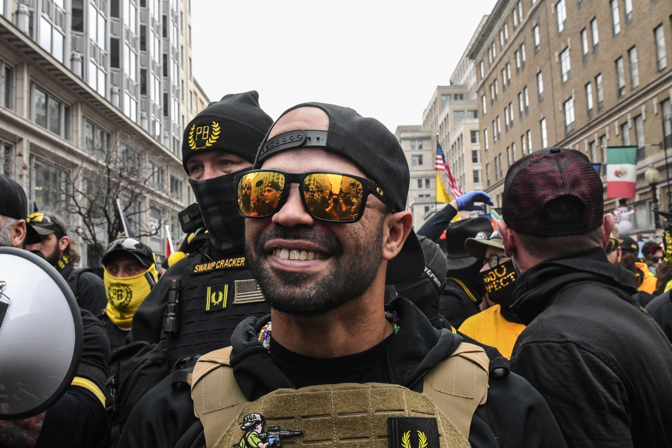 PHOTO: Enrique Tarrio, leader of the Proud Boys, stands outside Harry's bar during a protest, Dec. 12, 2020, in Washington, D.C.