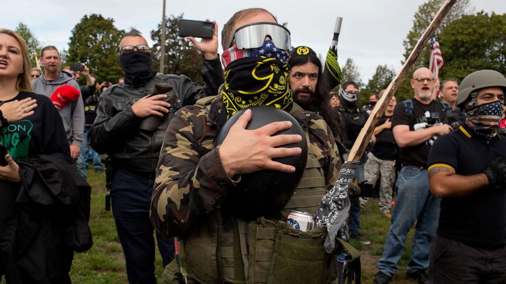 PHOTO: In this Sept. 26, 2020, file photo, members of the Proud Boys, a gang that supports President Trump, hold a rally  in Delta Park on the edge of Portland, Ore.