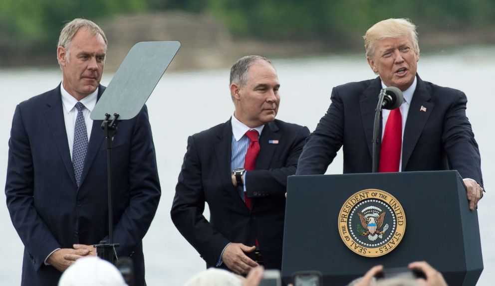 PHOTO: President Donald Trump, speaks while Secretary of the Interior Ryan Zinke, left, and EPA Administrator Scott Pruitt, stand at his side in Cincinnati, Ohio, June 7, 2017.