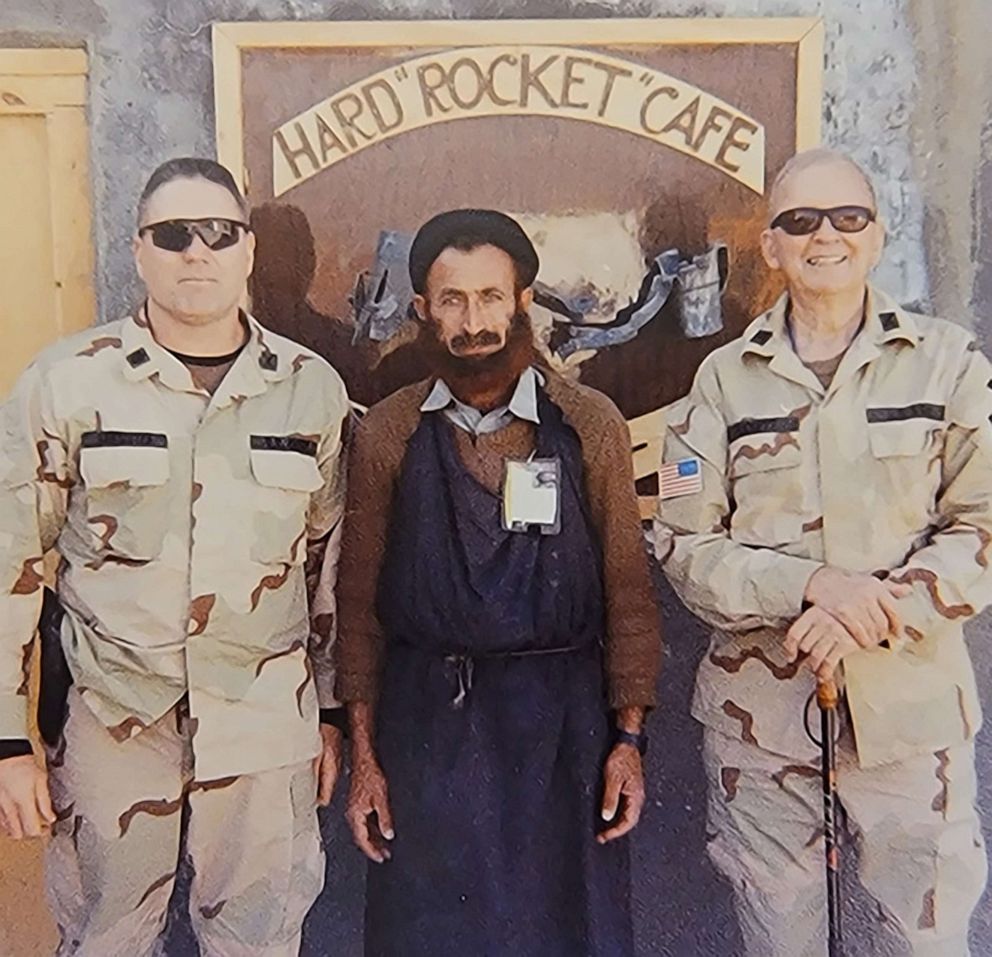 PHOTO: Retired Col. Ralph Puckett Jr. poses for a photo with then-Lt. Col. Jeff Bannister, 75th Ranger Regiment, and a local national friend, Afghanistan, 2005. Puckett was an honorary colonel of the 75th RR. 