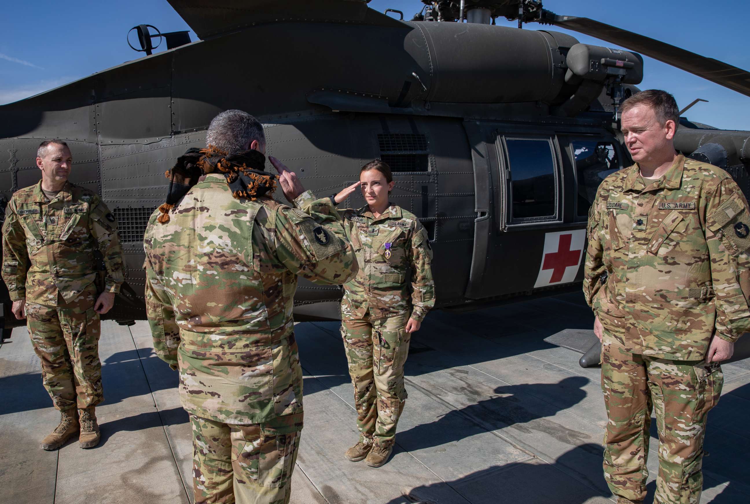 PHOTO: Abigail Holstein salutes Col. Greg Fix on May 3, 2020, after being presented with the Purple Heart medal for her injuries sustained during the ballistic missile attacks at Al Asad Air Base, Iraq, on Jan. 8, 2020.