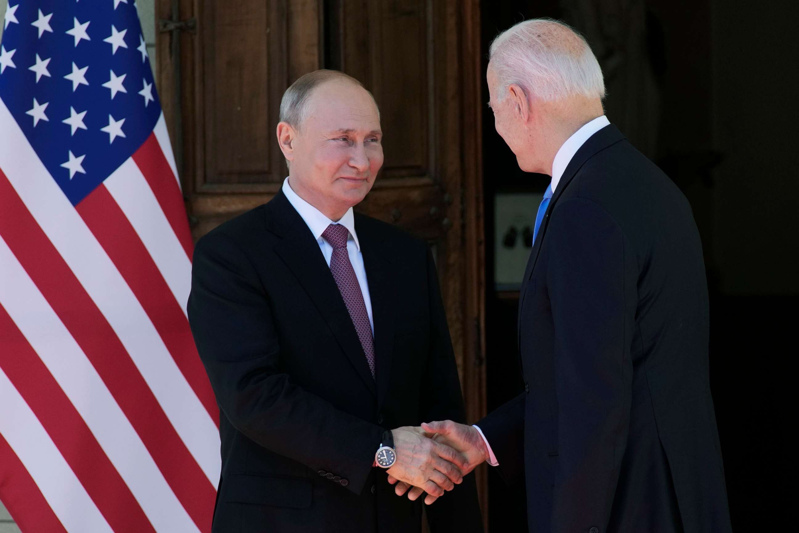 PHOTO: Russian President Vladimir Putin, left, and U.S President Joe Biden shake hands during their meeting at the 'Villa la Grange' in Geneva, Switzerland, June 16, 2021.