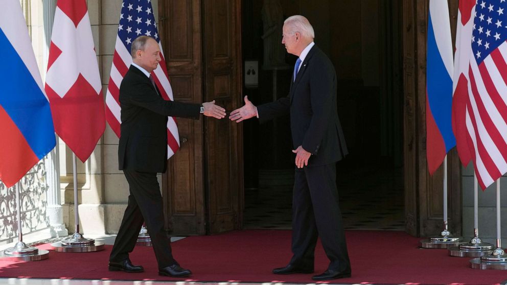 PHOTO: Russian President Vladimir Putin, left, and U.S President Joe Biden shake hands during their meeting at the 'Villa la Grange' in Geneva, Switzerland in Geneva, June 16, 2021.