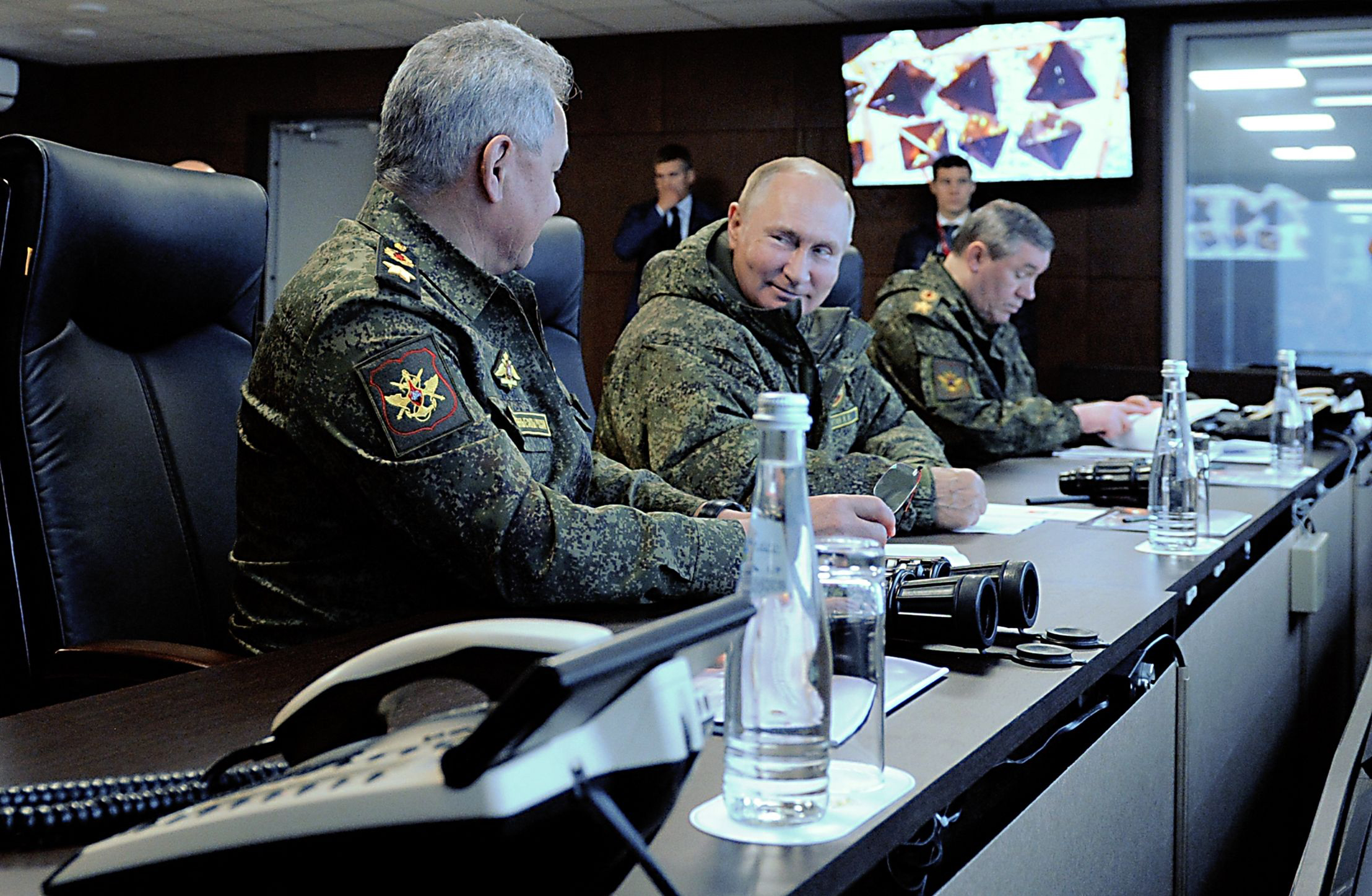 PHOTO: Russian President Vladimir Putin, accompanied by Defense Minister Sergei Shoigu (L) and Valery Gerasimov, the chief of the Russian General Staff, oversees the 'Vostok-2022' military exercises outside Ussuriysk, Russia, Sept. 6, 2022.