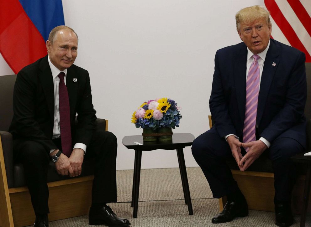 PHOTO: In this June 28, 2019, file photo, President Donald Trump and Russian President Vladimir Putin (L) attend their bilateral meeting at the G20 Osaka Summit 2019, in Osaka, Japan.
