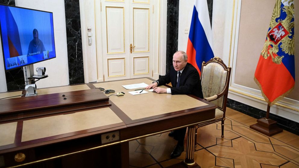 PHOTO: Russian President Vladimir Putin attends a televised meeting with officials to assess the consequences of an attack on the Crimean Bridge in Moscow, July 17, 2023.