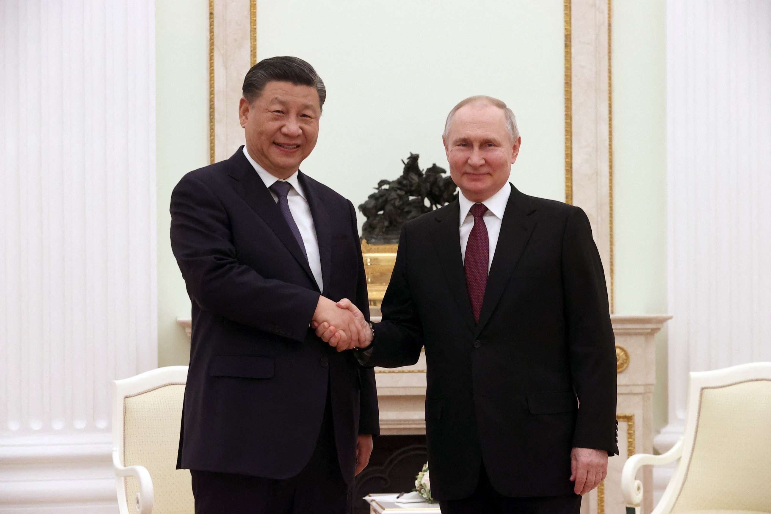 PHOTO: Russian President Vladimir Putin meets with China's President Xi Jinping at the Kremlin in Moscow, Mar. 20, 2023.