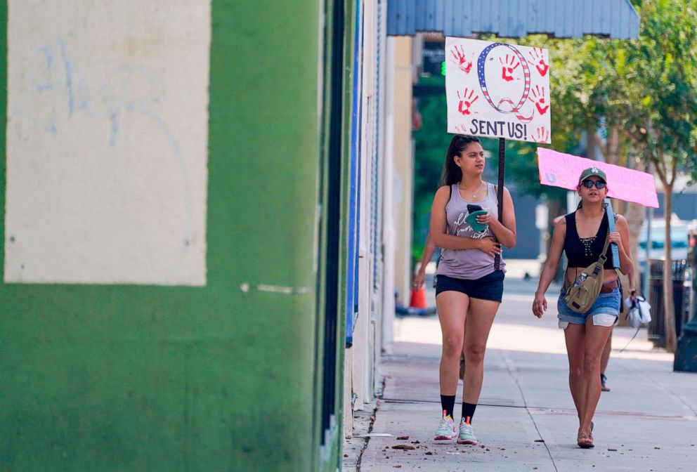 PHOTO: Conspiracy theorist QAnon demonstrators protest child trafficking on Hollywood Boulevard in Los Angeles, Aug. 22, 2020. 