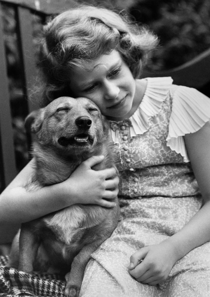 PHOTO: Princess Elizabeth, age 10, with her pet dog, in July 1936, in London.