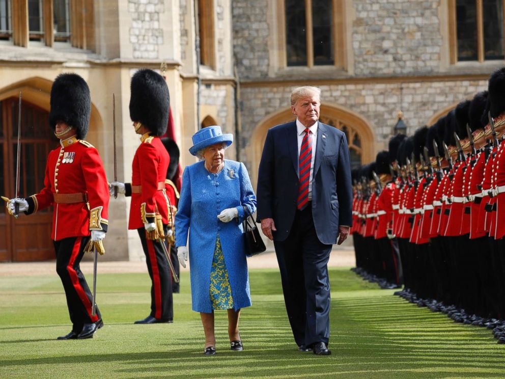 PHOTO: U.S. President Donald Trump with Queen Elizabeth II, inspects the Guard of Honour at Windsor Castle in Windsor, England.