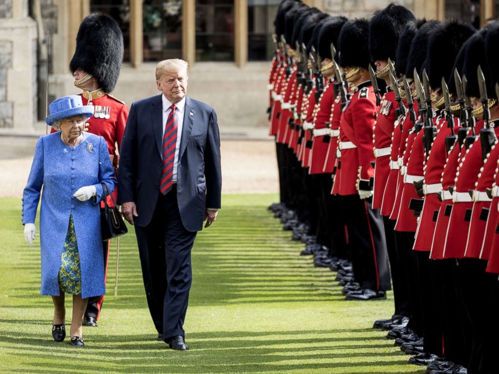 PHOTO: Britains Queen Elizabeth II and President Donald Trump inspect a Guard of Honor, formed of the Coldstream Guards at Windsor Castle, July 13, 2018, in Windsor, England.
