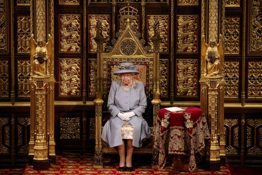 PHOTO: Britain's Queen Elizabeth prepares for her speech in the House of Lord's Chamber during the State Opening of Parliament in London, May 11, 2021.