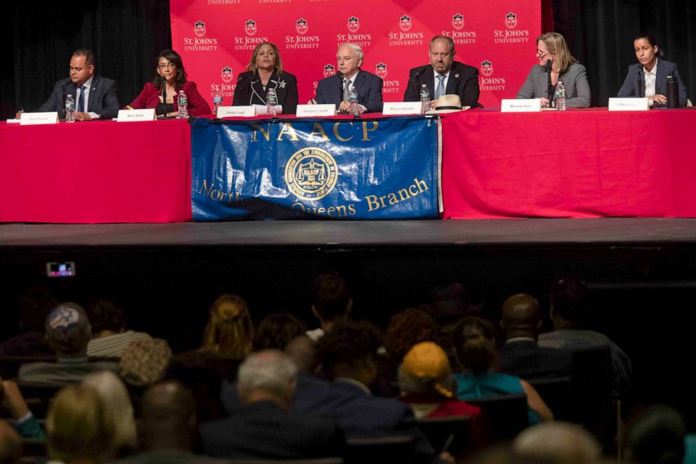PHOTO: Queens District Attorney candidates from left, Jose Nieves, Mina Malik, Betty Lugo, Gregory Lasak, Rory Lancman, Melinda Katz, and Tiffany Caban participate in a candidates forum at St. John's University in New York, June 13, 2019.