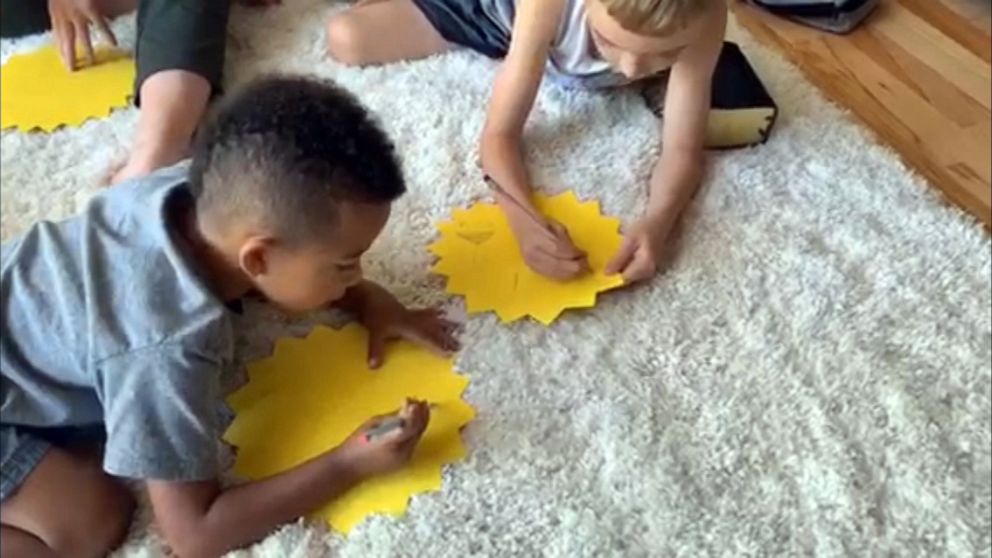 PHOTO: Chelsie Dort plays with her children at home in Utah.