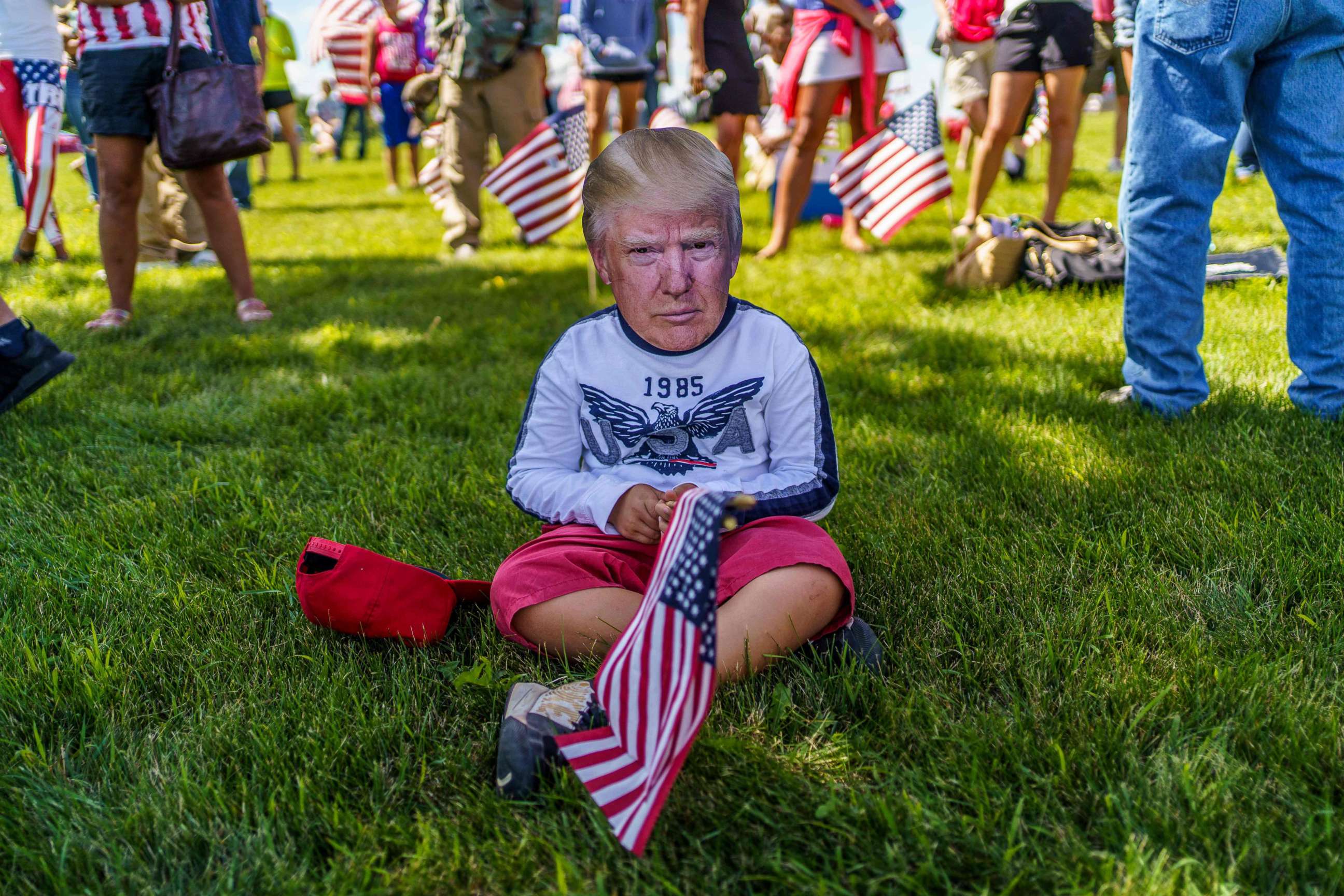 PHOTO: A supporter wears a mask of President Donald Trump on Aug. 17, 2020, in Mankato, Minn.