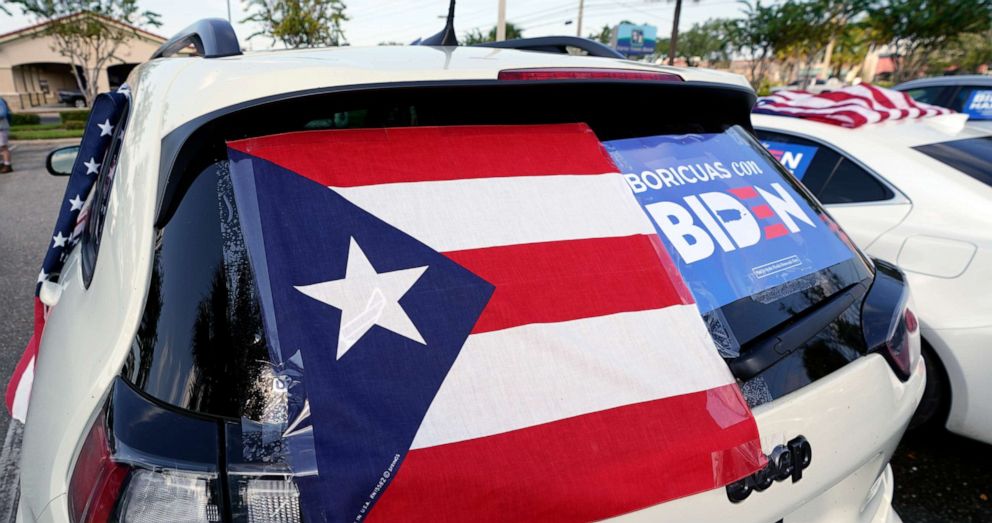 PHOTO: A vehicle with a Puerto Rican flag is parked at a rally supporting Democratic presidential candidate and former Vice President Joe Biden, Oct. 17, 2020, in Orlando, Fla.