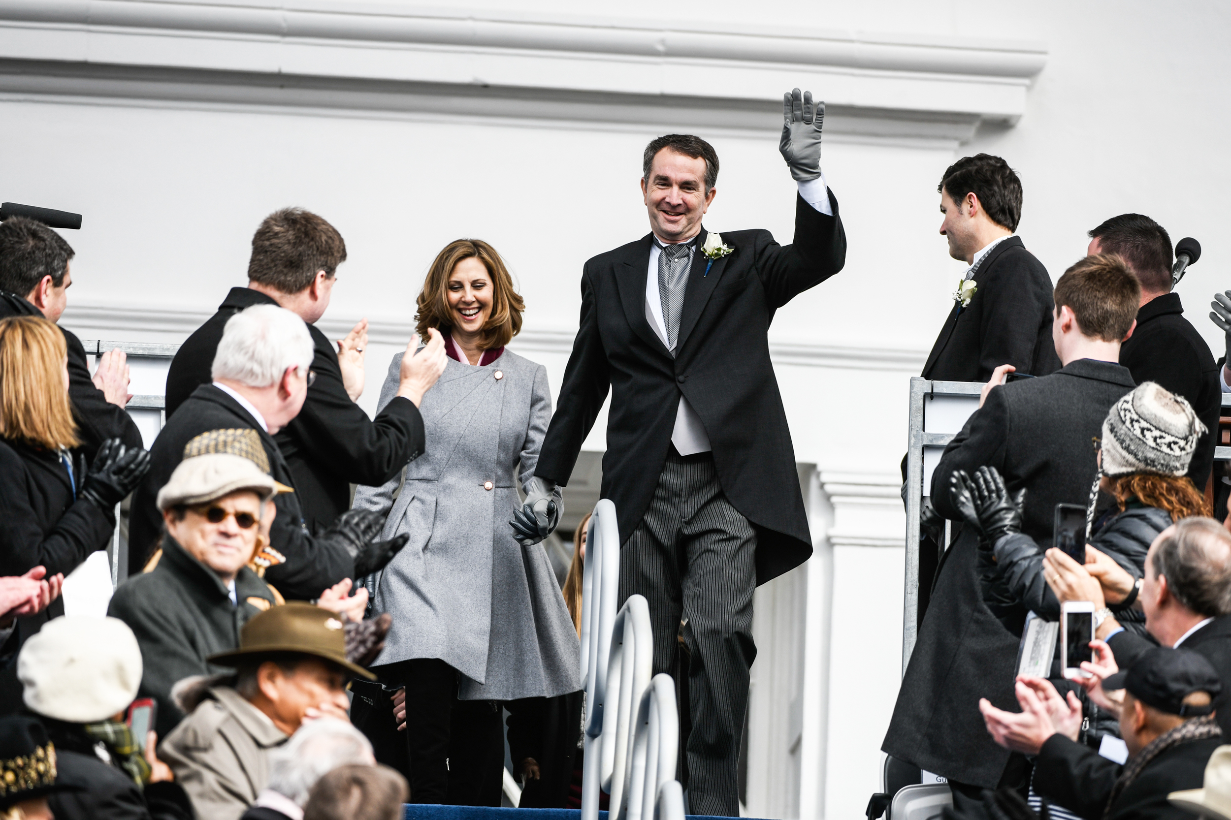 PHOTO: Gov. Elect Ralph Northam and his wife, Pam Northam make their way to the inaugural platform before taking the oath of the office on Jan. 13, 2018, at the Virginia State Capitol in Richmond, VA. 