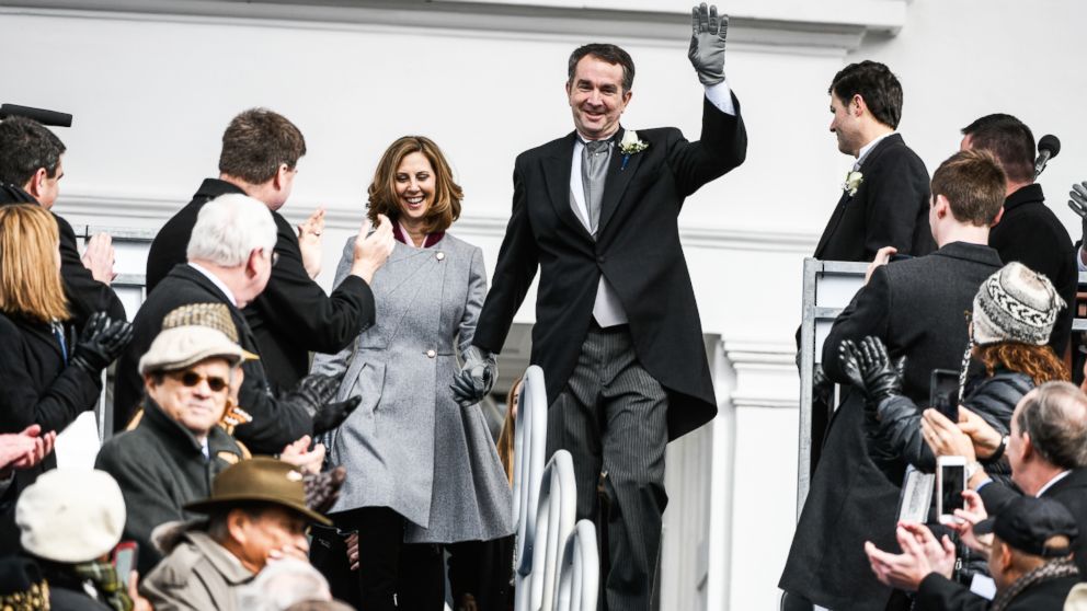 Gov. Elect Ralph Northam and his wife, Pam Northam make their way to the inaugural platform before taking the oath of the office on Jan. 13, 2018, at the Virginia State Capitol in Richmond, VA.