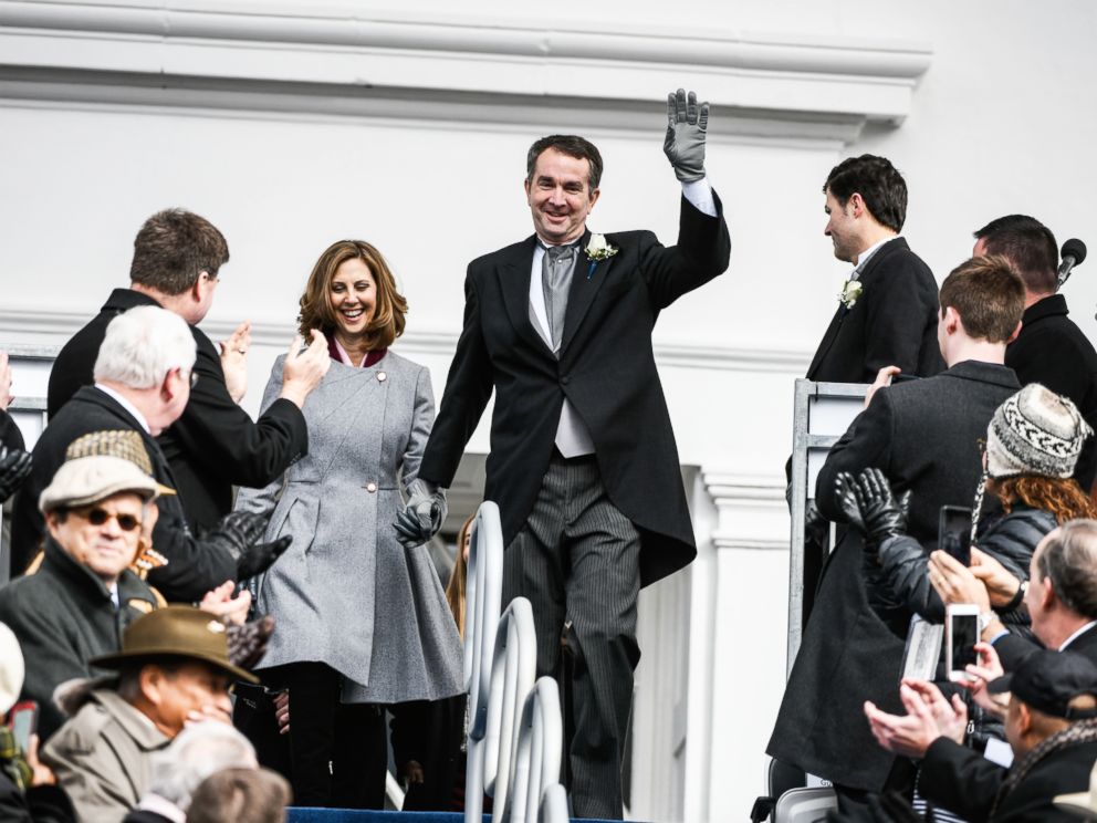 PHOTO: Gov. Elect Ralph Northam and his wife, Pam Northam make their way to the inaugural platform before taking the oath of the office on Jan. 13, 2018, at the Virginia State Capitol in Richmond, VA.