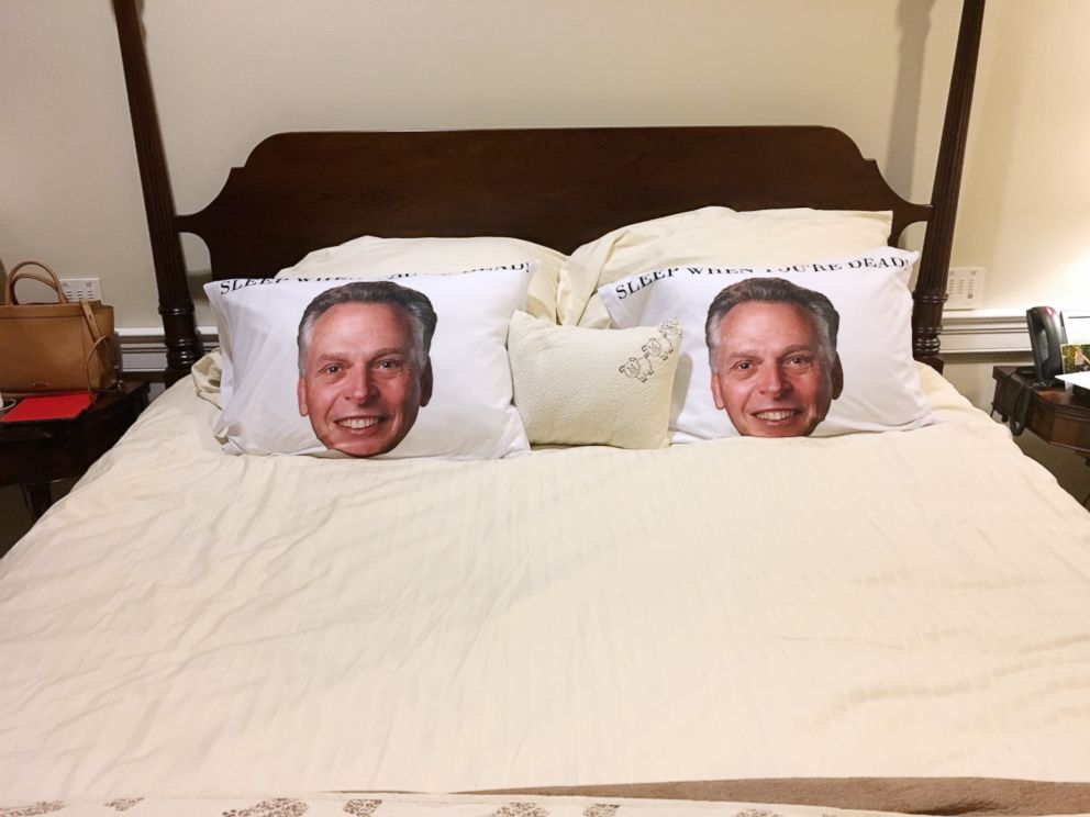 This image provided by the office of Governor of Virginia shows a photo of two pillowcases with a portrait of former gov. Terry McAuliffe on the bed at the Governor's mansion at the Capitol in Richmond, Va., Dec. 13, 2018. 

