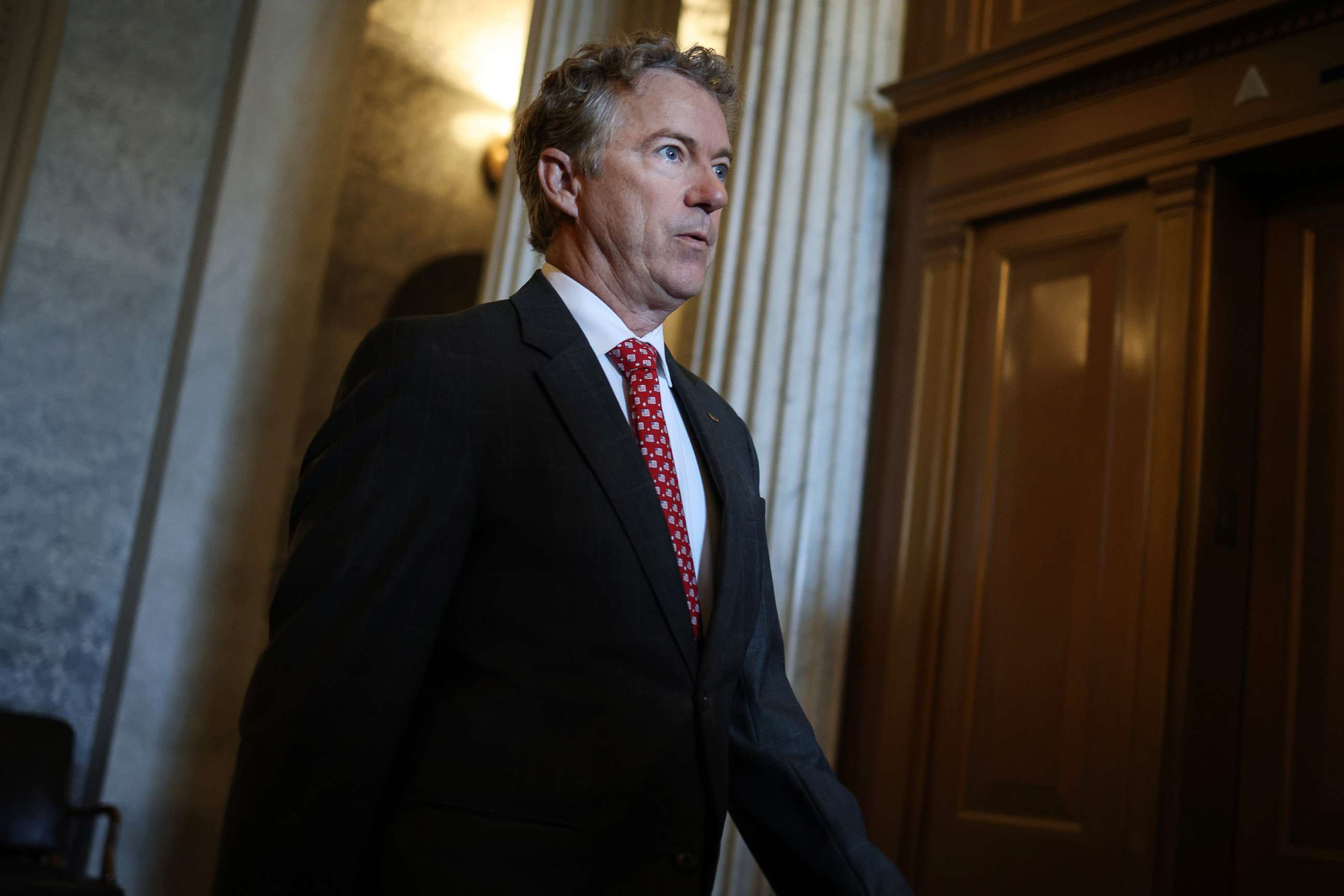 PHOTO: Sen. Rand Paul departs from the Senate Chambers in the U.S. Capitol on July 21, 2021, in Washington, D.C.