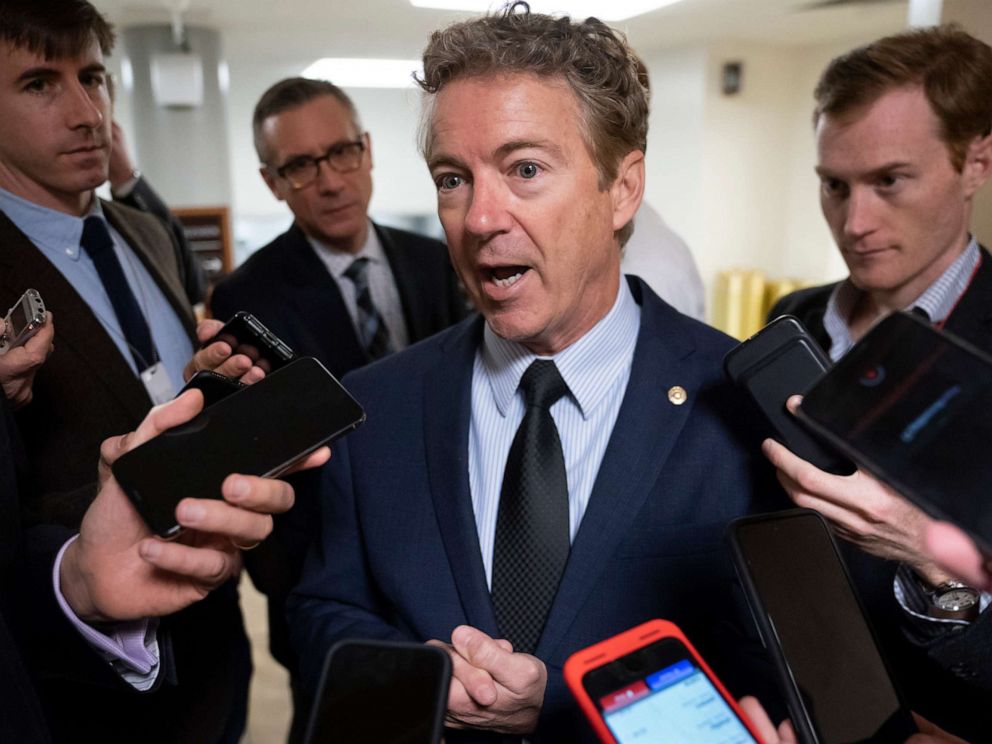 PHOTO: Sen. Rand Paul responds to reporters at the Capitol after he threatened to reveal the name of the Ukraine whistleblower, in Washington, Nov. 6, 2019.