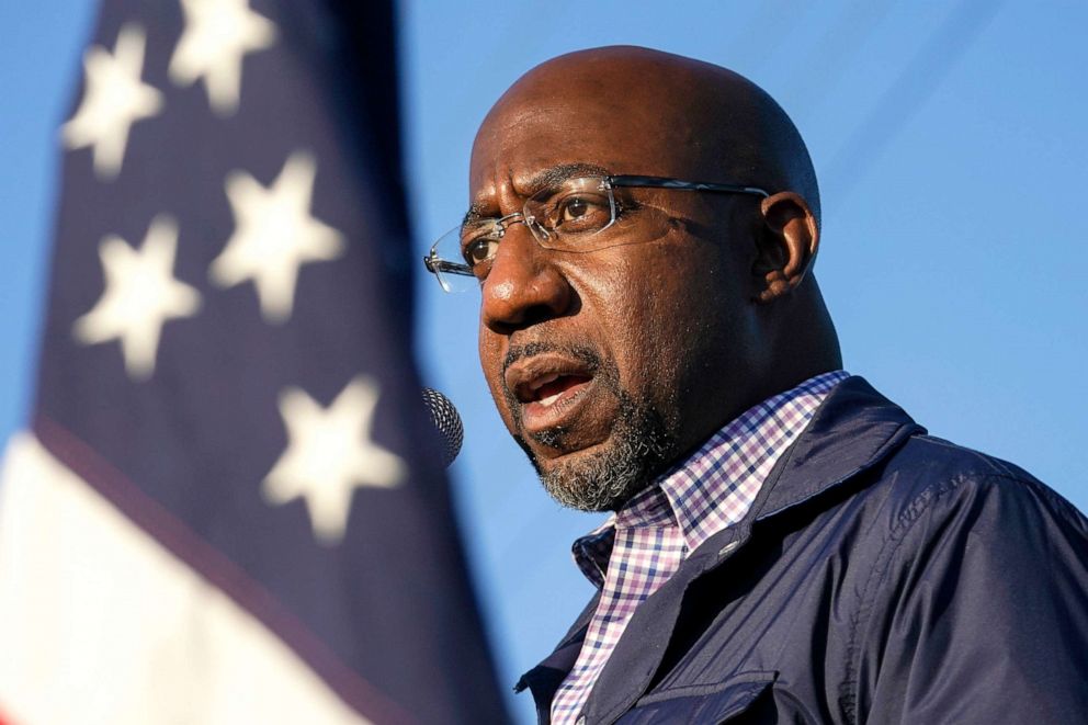 PHOTO: Raphael Warnock, a Democratic candidate for the U.S. Senate, speaks during a campaign rally in Marietta, Ga. Warnock and U.S. Sen. Kelly Loeffler are in a runoff election for the Senate seat.