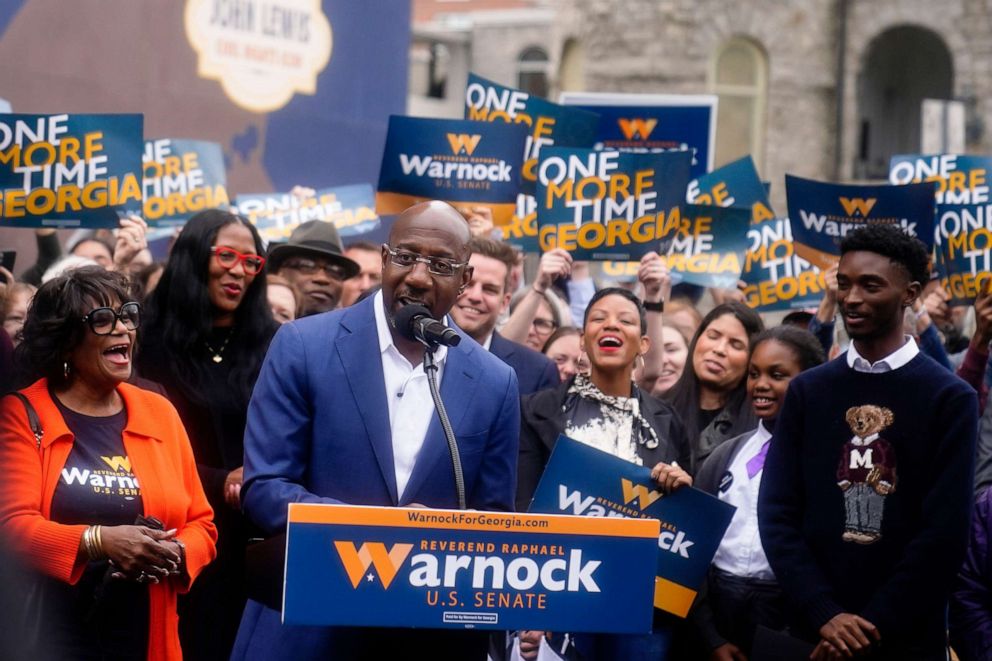 PHOTO: Democratic nominee for U.S. Senate Sen. Raphael Warnock speaks during a news conference, on Nov. 10, 2022, in Atlanta.