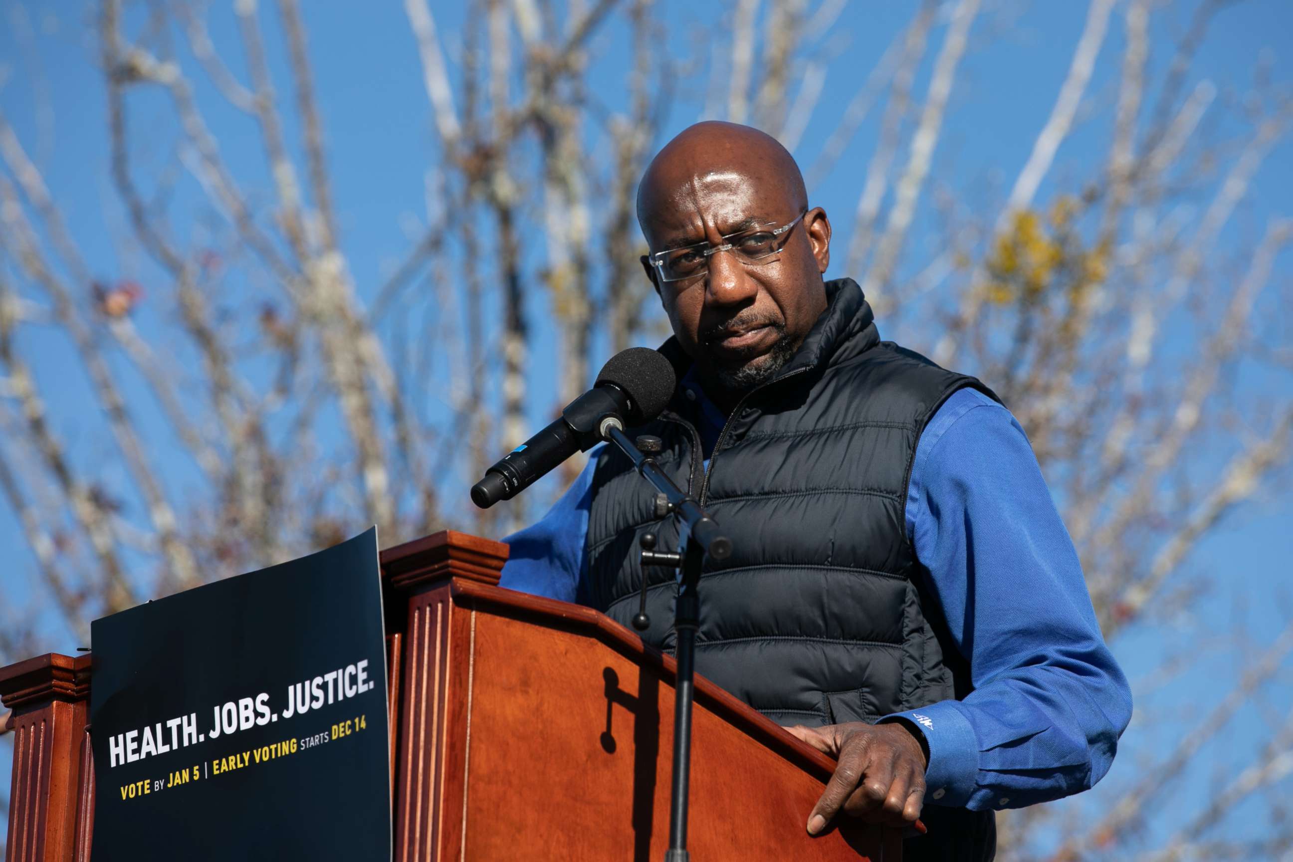 PHOTO: Democratic Senate candidate Raphael Warnock speaks to the crowd during an outdoor drive-in rally, Dec. 5, 2020, in Conyers, Georgia.