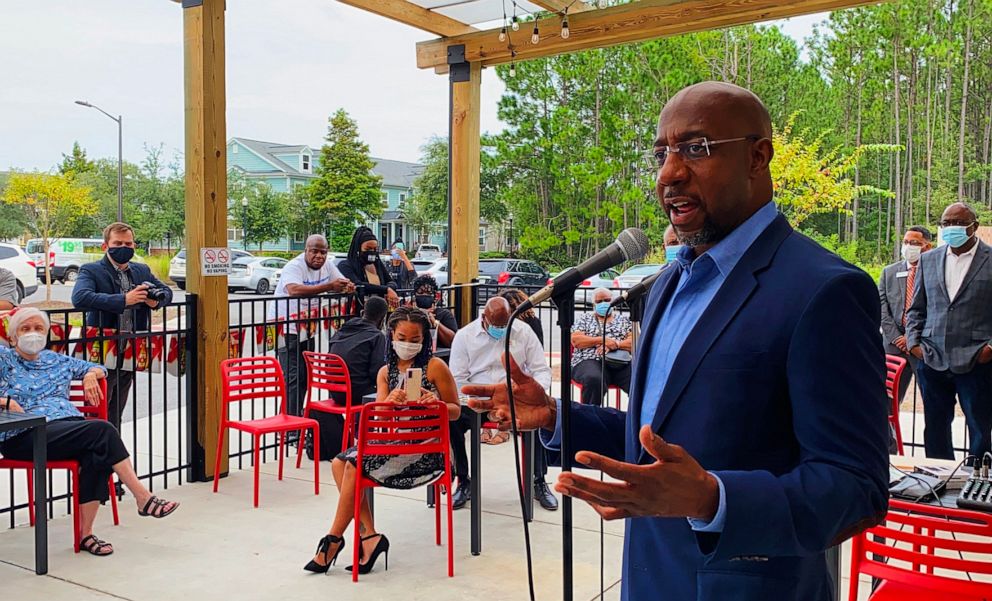 PHOTO: In this undated photo posted to his Twitter account, Reverend Raphael Warnock speaks at a meet and greet in Georgia.