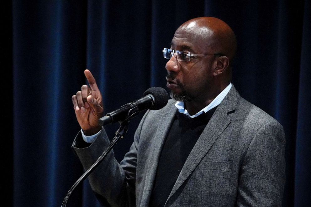 PHOTO: Reverend Raphael Warnock speaks during a midterm runoff election rally at Georgia Institute of Technology in Atlanta, Dec.  5, 2022.