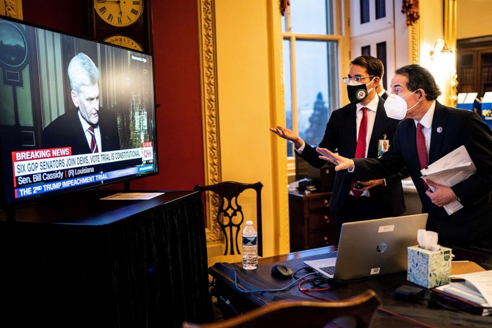Lead House impeachment manager Rep. Jamie Raskin and counsel Joshua Matz watch as Republican Sen. Bill Cassidy explains why he switched his vote regarding the constitutionality of impeaching former President Donald Trump in Washington on Feb. 9, 2021.