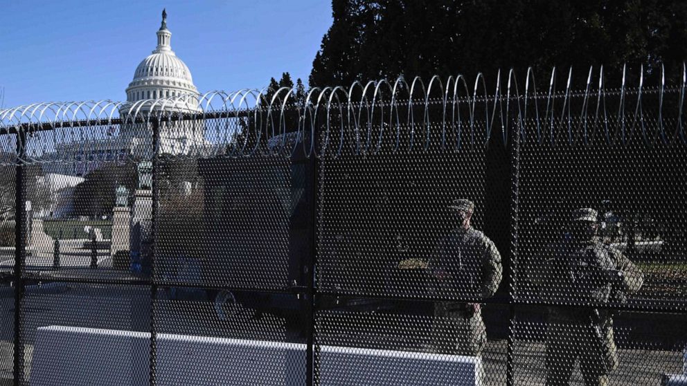 PHOTO: Barbed wire is installed on the top of a security fence surrounding the U.S. Capitol in Washington, D.C., Jan. 14, 2021, ahead of the presidential inauguration of Joe Biden on Jan. 20.