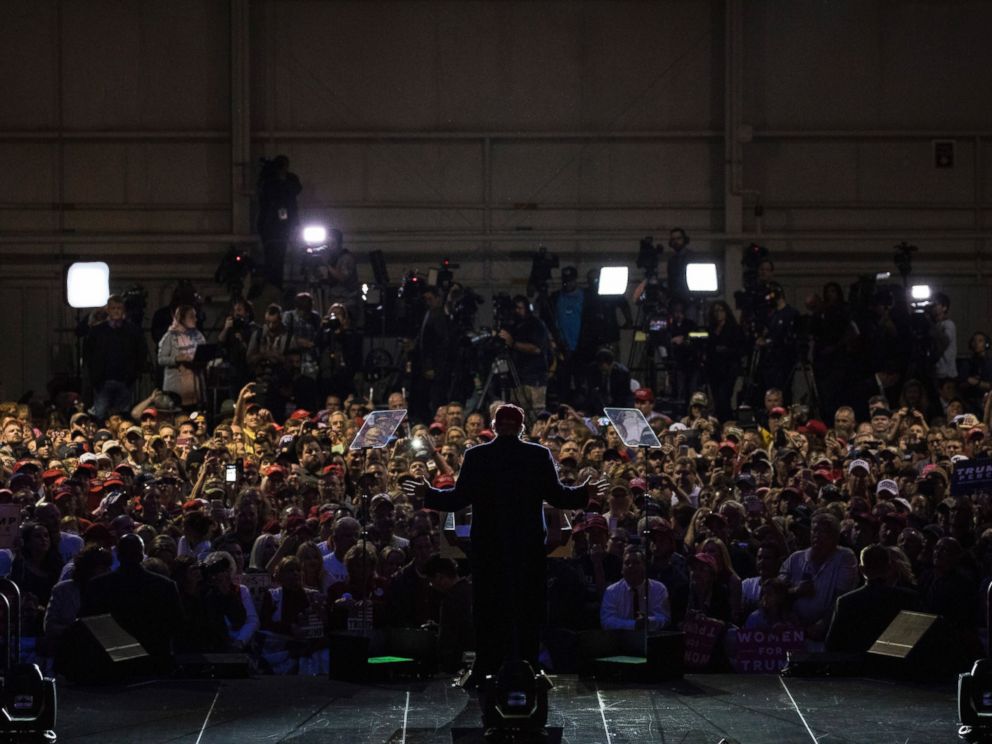 PHOTO: Donald Trump speaks during a campaign event at the Pittsburgh International Airport, Nov. 6, 2016. Members of the media are positioned behind the crowd.