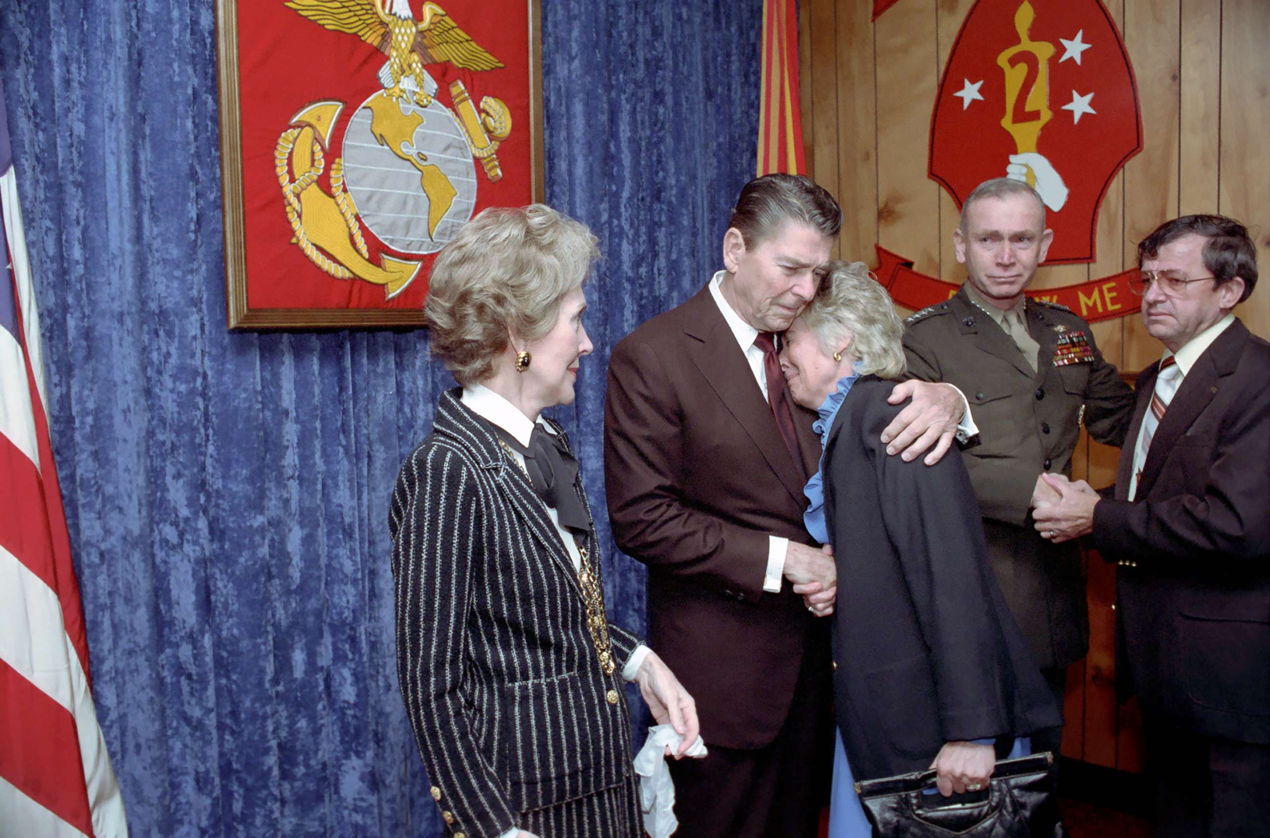 PHOTO: President Reagan consoles a mourner during a memorial service for servicemen killed and wounded in Lebanon and Grenada at the Marine Headquarters Building at Camp Lejeune in North Carolina, Nov. 4, 1983.