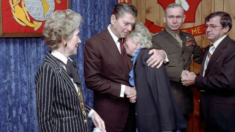 PHOTO: President Reagan consoles a mourner during a memorial service for servicemen killed and wounded in Lebanon and Grenada at the Marine Headquarters Building at Camp Lejeune in North Carolina, Nov. 4, 1983.