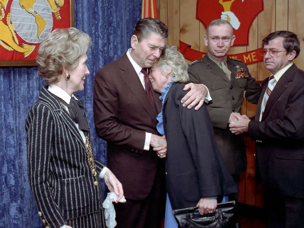 PHOTO: President Reagan consoles a mourner during a memorial service for servicemen killed and wounded in Lebanon and Grenada at the Marine Headquarters Building at Camp Lejeune in North Carolina, Nov. 4, 1983.