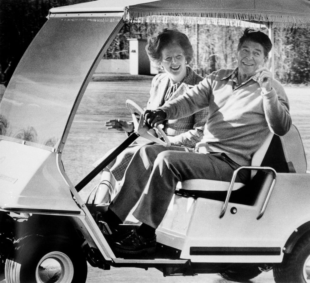 PHOTO: President Reagan and British Prime Minister Margaret Thatcher wave to photographers as they drive toward Aspen Lodge for meetings at Camp David near Thurmont, Md., Dec. 22, 1984.