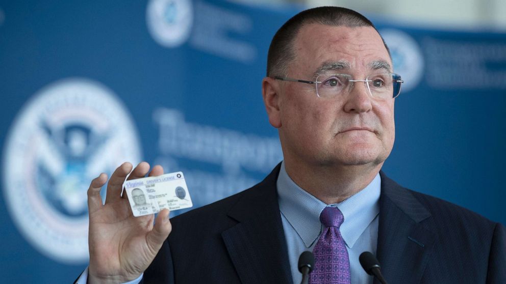 PHOTO: Chief Executive Officer of the American Association of Airport Executives, Todd Hauptli, shows his "Real ID" compliant driver's license during a news conference at Ronald Reagan Washington National Airport, in Washington, Oct. 1, 2019.