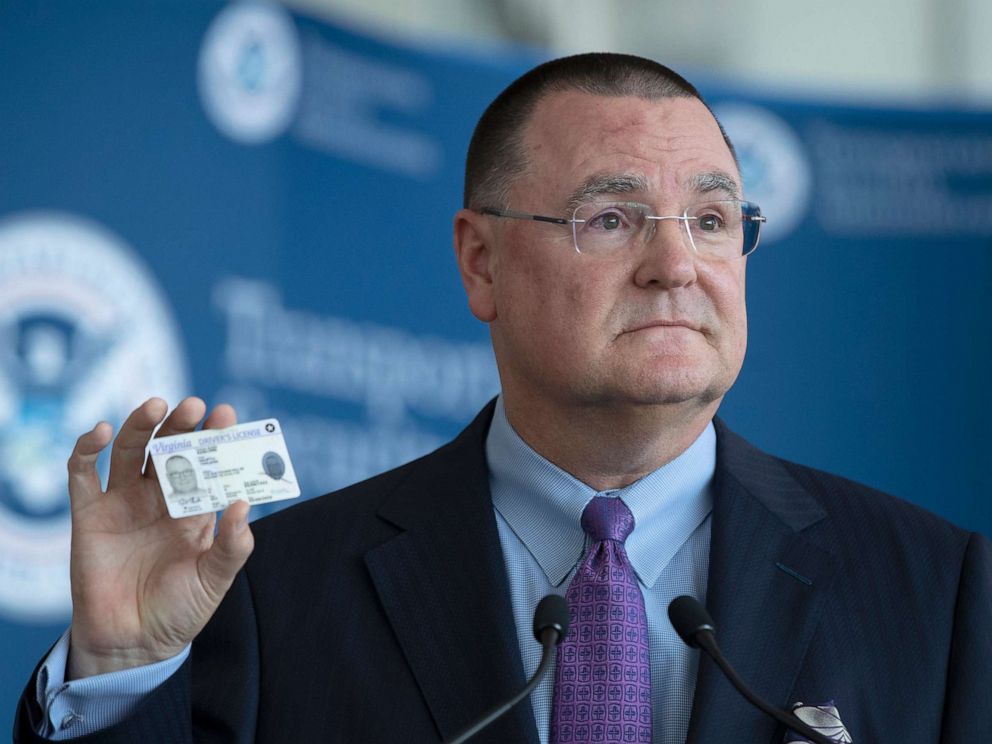 PHOTO: Chief Executive Officer of the American Association of Airport Executives, Todd Hauptli, shows his Real ID compliant drivers license during a news conference at Ronald Reagan Washington National Airport, in Washington, Oct. 1, 2019.