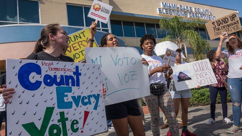 PHOTO: A crowd protests to demand a recount outside of the Miami-Dade Election Department in Miami, Nov. 10, 2018. A possible recount looms in a tight Florida governor, Senate and agriculture commission race.