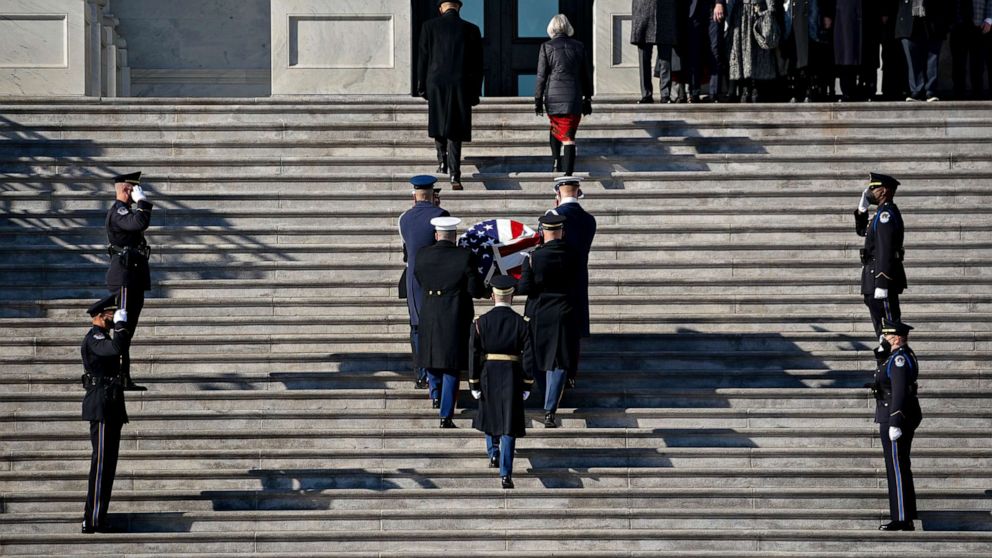 PHOTO: The casket of the late Senator Harry Reid is carried into the U.S. Capitol, on Jan. 12, 2022, in Washington, D.C., where Reid will lie in state in the Capitol Rotunda.