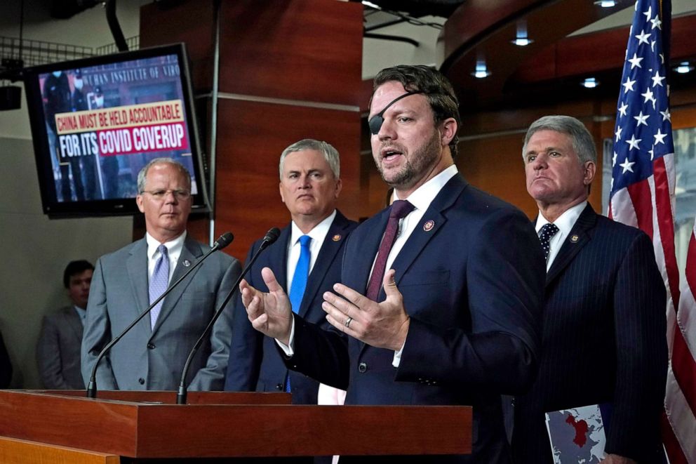 PHOTO: Rep. Dan Crenshaw, joined by Rep. Brett Guthrie and Republican House members James Comer and  Michael McCaul, speaks at a news conference to charge China with a coverup of the origin of COVID-19, at the Capitol in Washington, D.C., June 23, 2021.