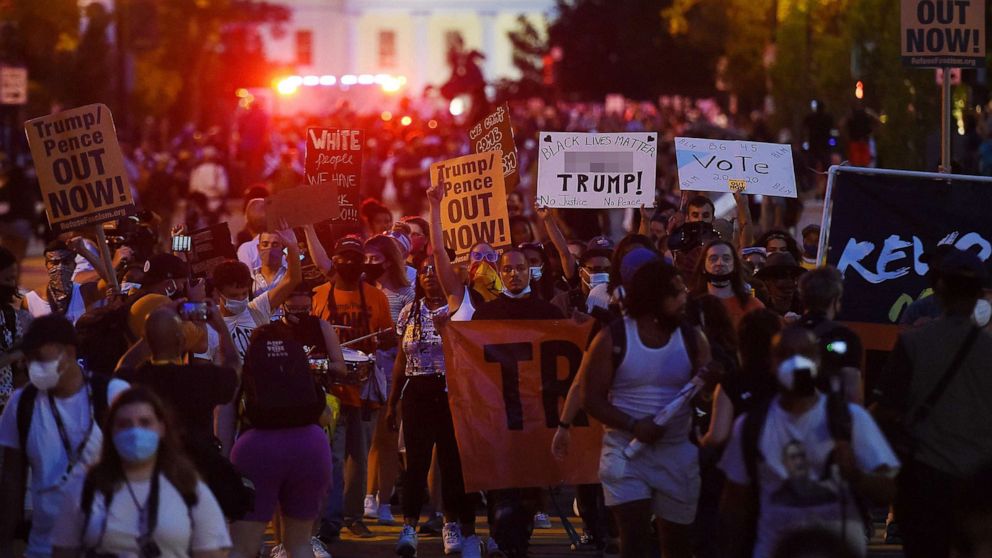PHOTO: Demonstrators rally to protest President Donald Trump's acceptance of the Republican National Convention nomination at Black Lives Matter plaza across from the White House, Aug. 27, 2020, in Washington.
